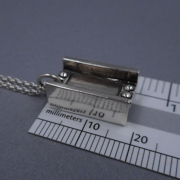 Size of I-Beam Pendant from Forged Mettle Jewelry