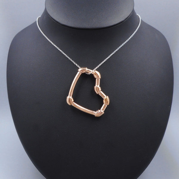 Copper pipe heart necklace on bust from Forged Mettle Jewelry