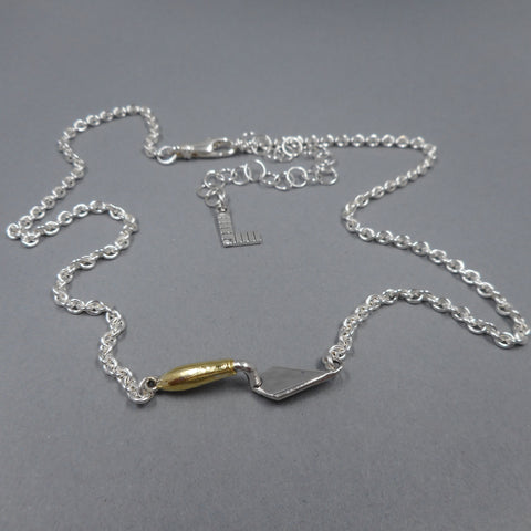 Trowel Necklace in Sterling Silver & 22k Gold from Forged Mettle Jewelry