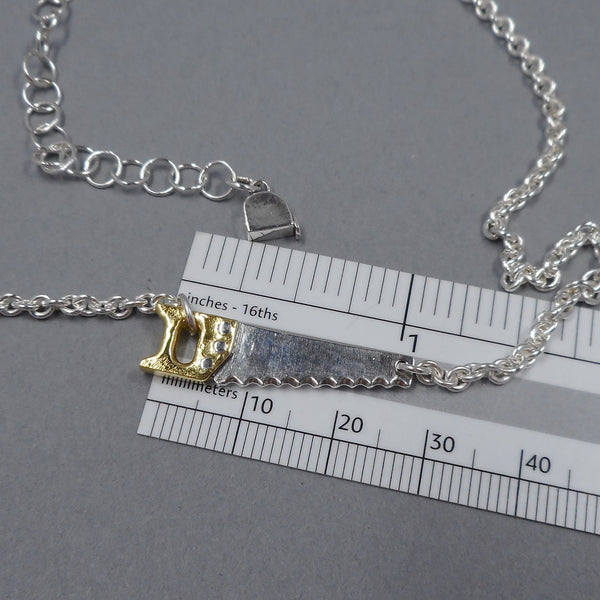 Saw of Hand Saw Necklace from Forged Mettle Jewelry