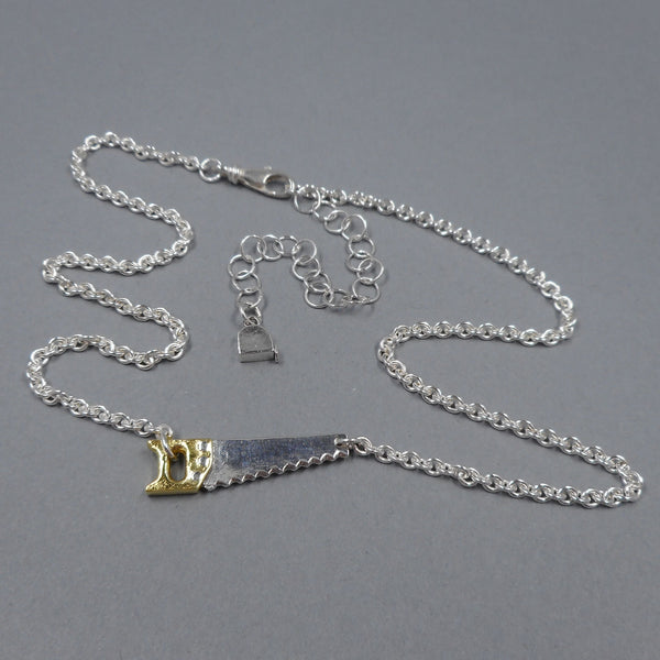 Hand Saw Necklace in Sterling Silver & 22k Gold from Forged Mettle Jewelry