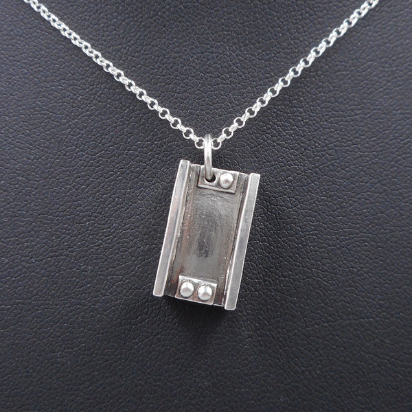 Solid Sterling Silver I-Beam pendant from Forged Mettle Jewelry