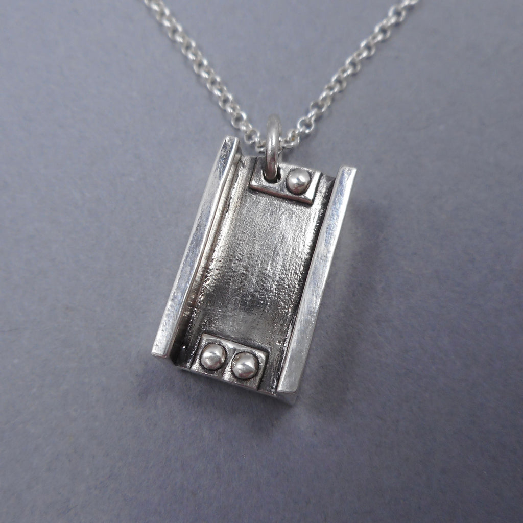Handcrafted I-Beam pendant in sterling silver from Forged Mettle Jewelry