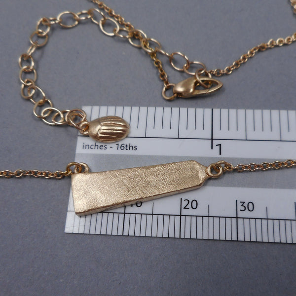 Size of 14k Gold Obelisk Necklace from Forged Mettle Jewelry