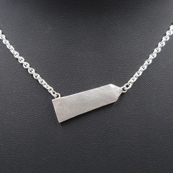 Close up of Obelisk necklace  from Forged Mettle Jewelry