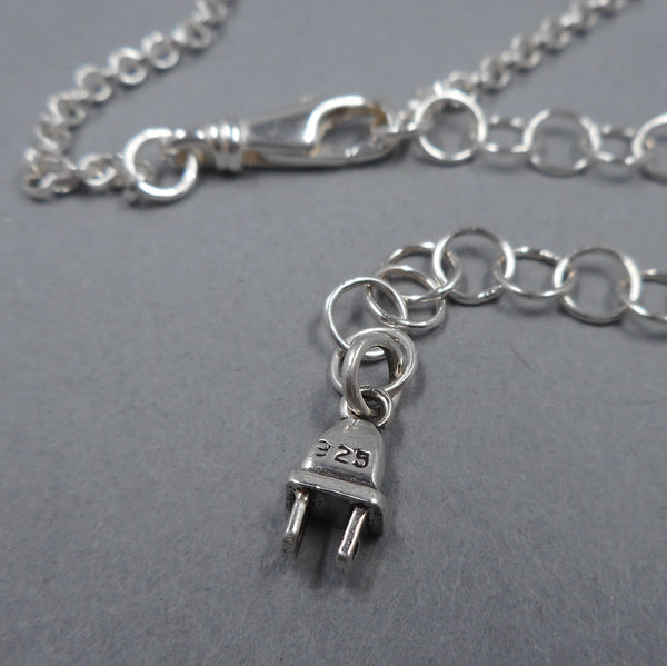 Sterling Silver plug extender charm from Forged Mettle Jewelry