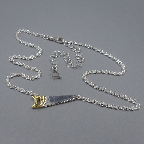 Hand Saw Necklace in Sterling Silver & 22k Gold from Forged Mettle Jewelry